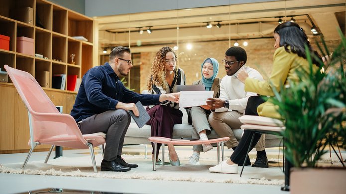 Multiethnic Youthful Group of People Preparing a Presentation in międzynarodowa grupa ludzi