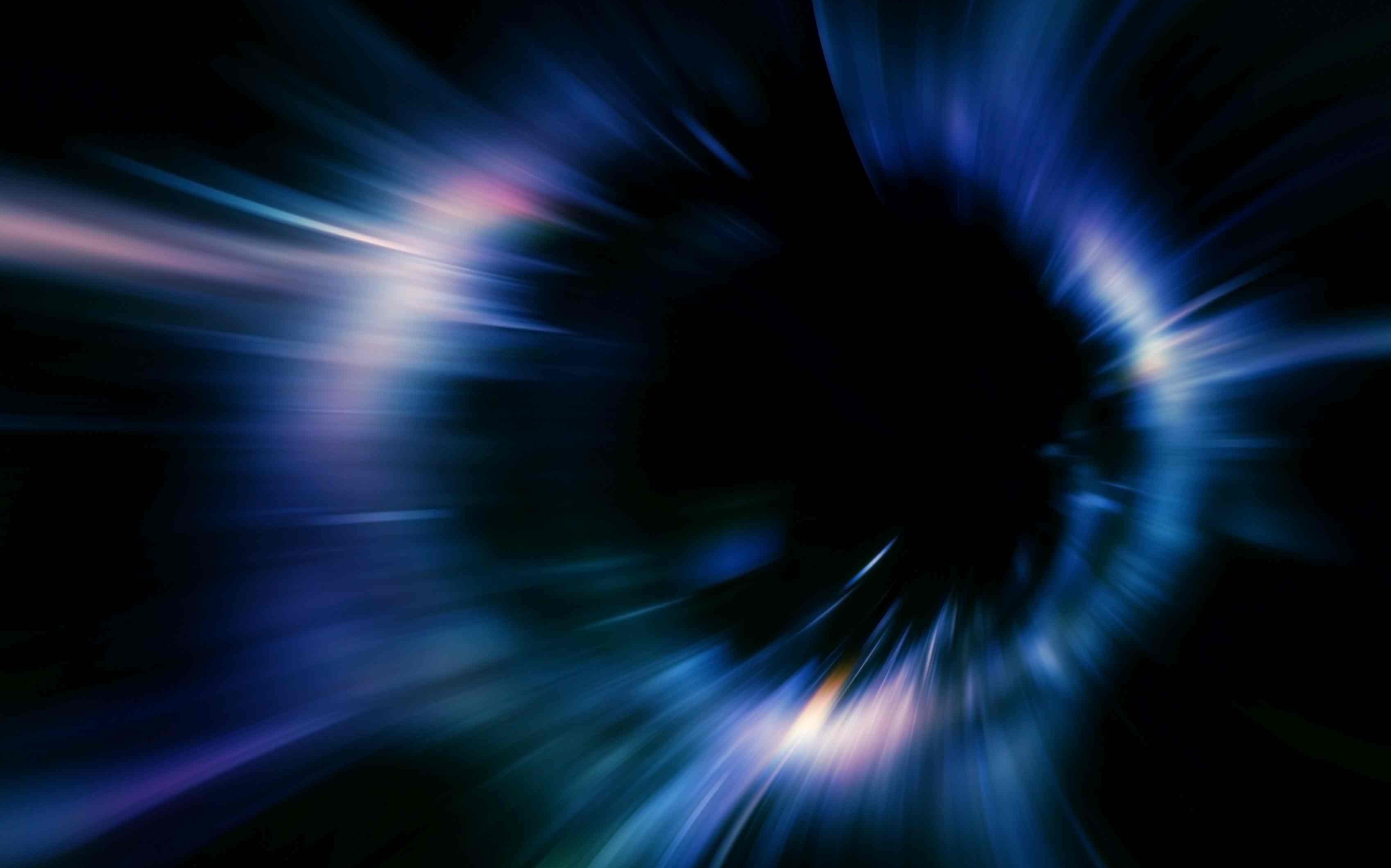 Abstract blue spinning wormhole.